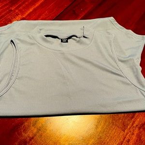 Ribbed, mock neck bodysuit - never worn. Lovely layering piece for fall!